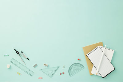 High angle view of pen on table against white background