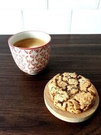 Close-up of coffee cup on table