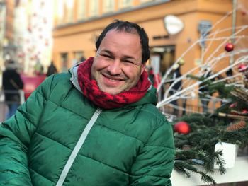 Portrait of smiling man in warm clothing outdoors