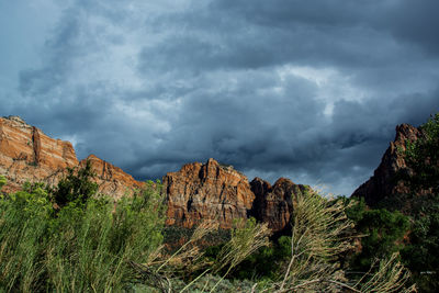 Panoramic view of rocky mountains against sky