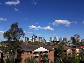 Buildings against blue sky