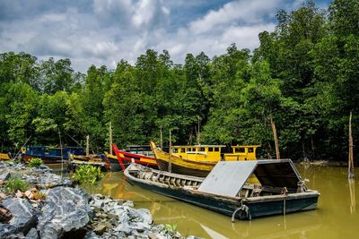 Fisherman place with boats at the river