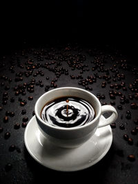 High angle view of coffee cup on table