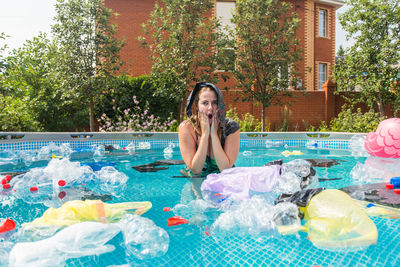 Young woman in swimming pool