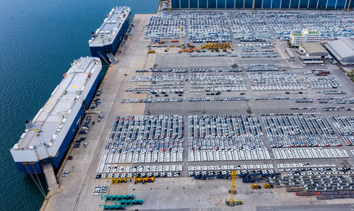 High angle view of commercial dock by sea