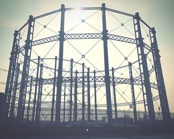 Low angle view of rollercoaster against sky