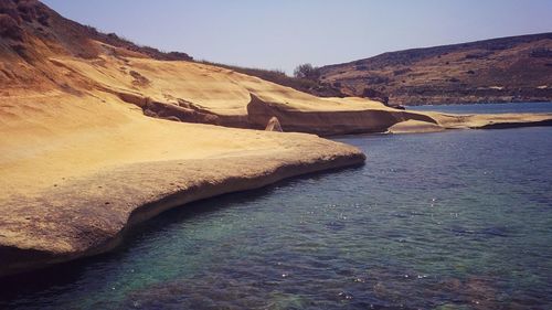 Scenic view of rock formation in sea