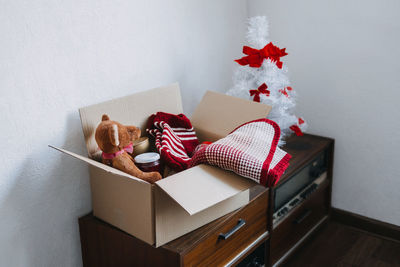 Christmas donation hampers, help refugees and homeless. xmas charity donation box with warm clothes, 