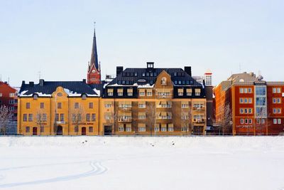 Buildings against clear sky