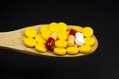 Close-up of multi colored candies on table