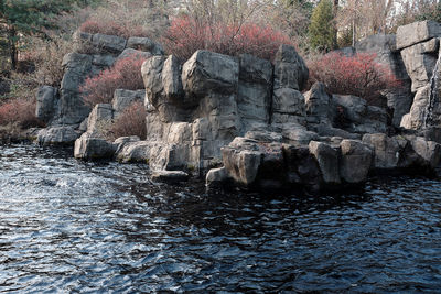 View of rock formation by river