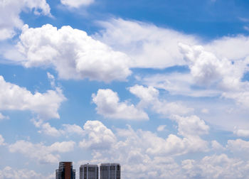 High-rise building and bright blue sky