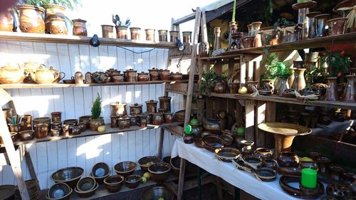 Bottles on display at market stall