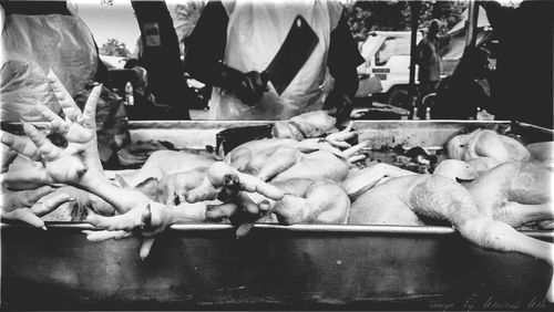 Man preparing food for sale in market