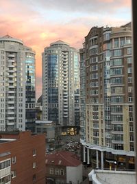 High angle view of buildings in city against sky