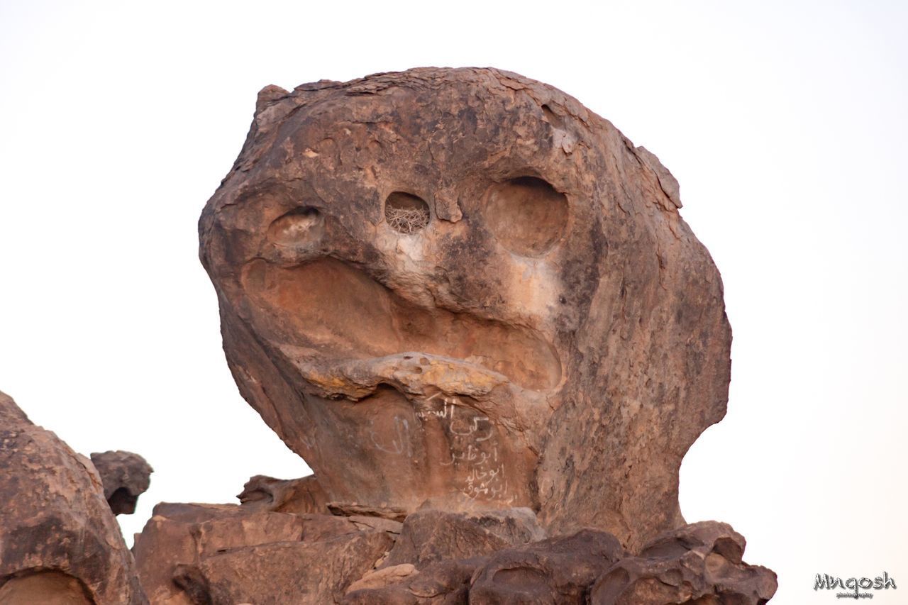 LOW ANGLE VIEW OF ROCK FORMATION AGAINST SKY