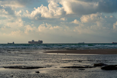 Scenic view of beach against sky