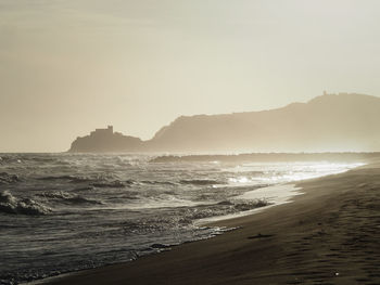 Scenic view of sea at sunset