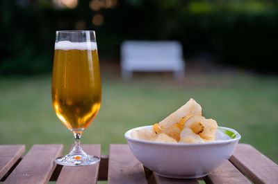 Close-up of beer in glass on table