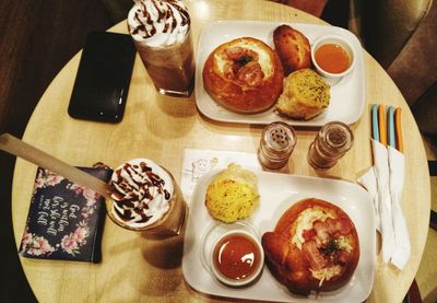 High angle view of breakfast served on table