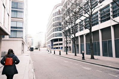 People walking on street in city