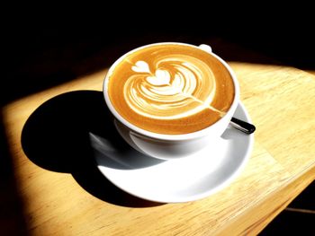 High angle view of cappuccino on table