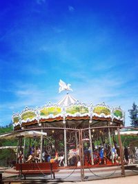 Low angle view of built structure against blue sky