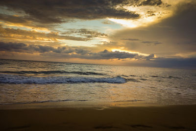 Scenic view of beach against sky