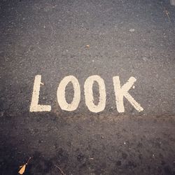 High angle view of text on road