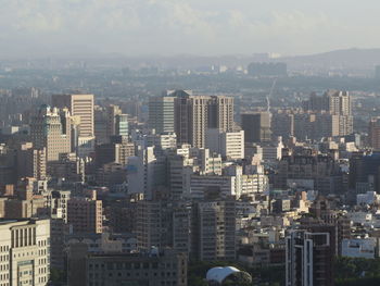 Modern buildings in city against sky