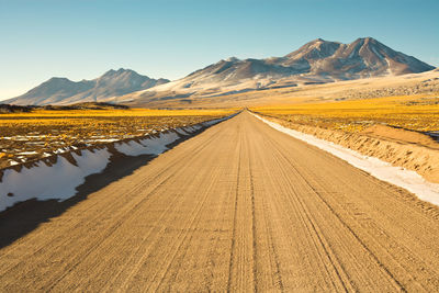 Scenic view of arid landscape against sky