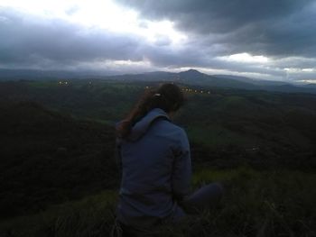 Rear view of man looking at mountain