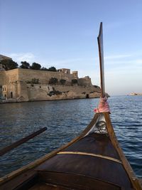 Nautical vessel on sea against sky