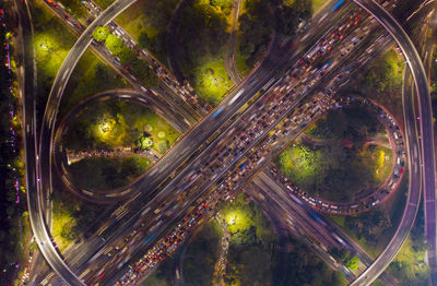 Aerial view of light trails on elevated road