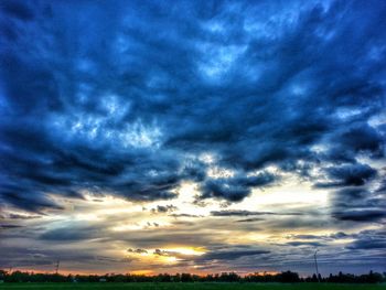 Low angle view of storm clouds over dramatic sky