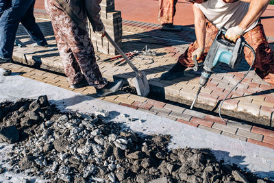 Workers working on footpath