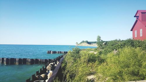 Scenic view of sea against clear sky