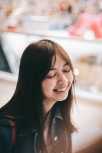 Portrait of a smiling young woman