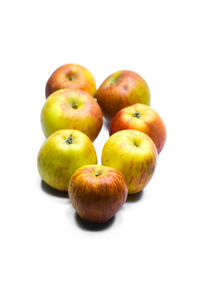 Close-up of apples against white background