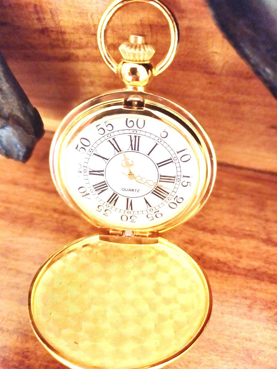 time, table, indoors, accuracy, pocket watch, still life, number, clock, antique, watch, close-up, instrument of time, wood - material, no people, shape, circle, high angle view, focus on foreground, geometric shape, personal accessory, minute hand