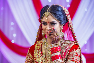 Bride in sari looking away
