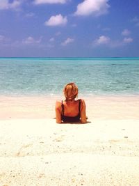 Woman relaxing on beach