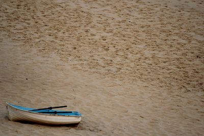 High angle view of boats moored on shore