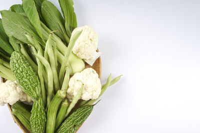 High angle view of vegetables against white background