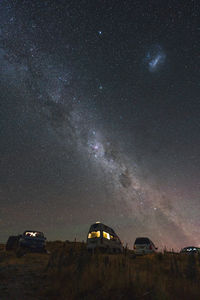 View of the starry sky while van camping at lake pukaki, new zealand