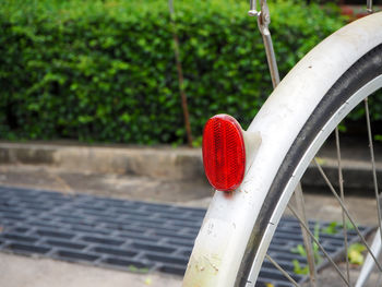 Close-up of red light on bicycle