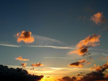 Low angle view of cloudy sky at sunset