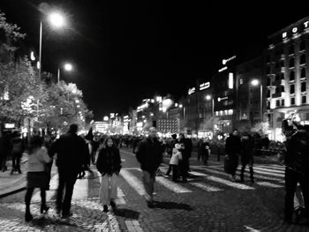 People on street at night