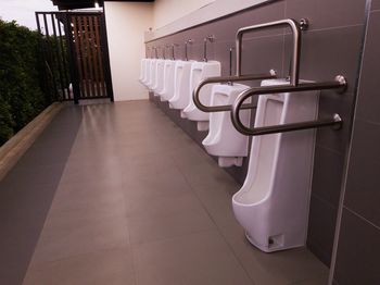 Empty seats on tiled floor in building