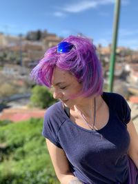 Portrait of woman with purple hair